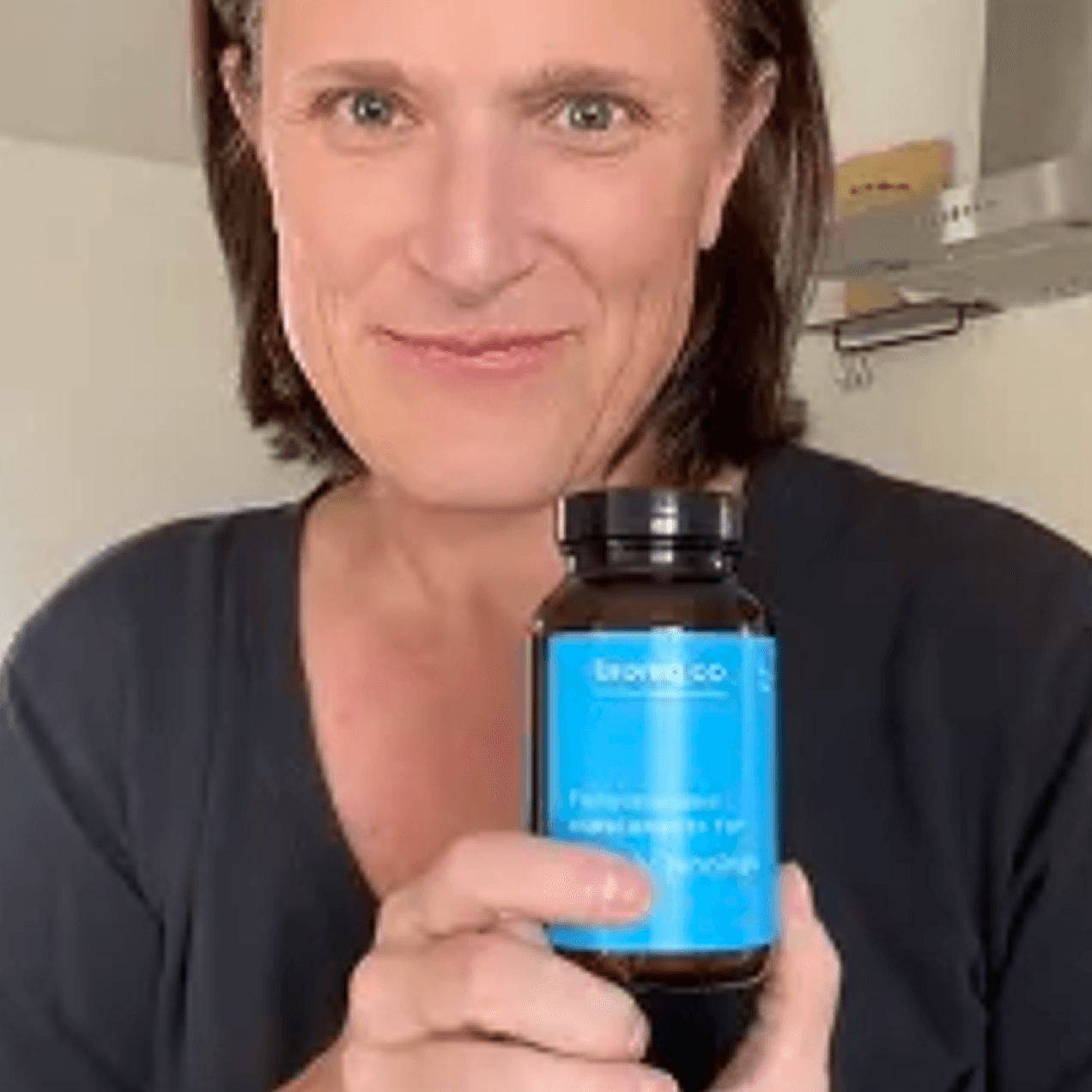 Portrait of customer holding personalised Bioniq Bottle